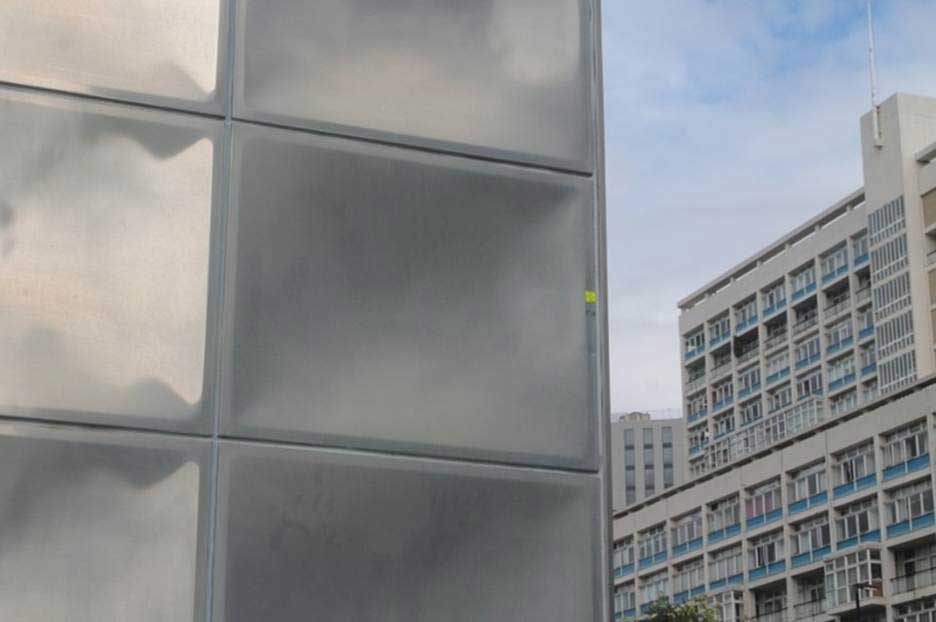 The Dented Stainless Steel Panels Constructing the Faraday Memorial