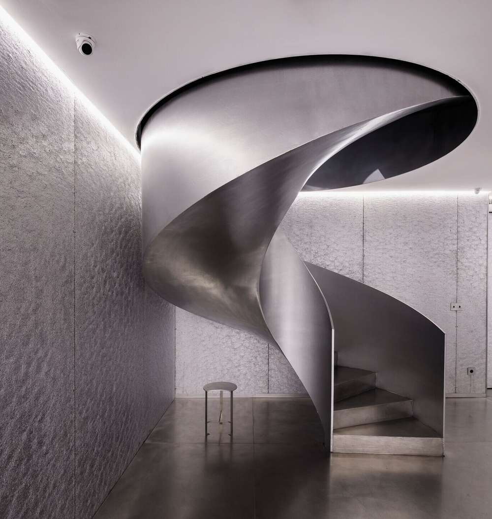 The Helicoidal Stair of MKR Shop Slides at an Angle of 90 degrees (Photo Courtesy of Fernando Alda& Archello 2026)