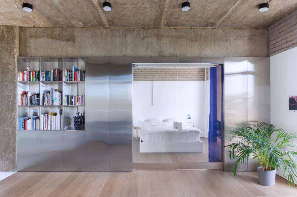 The Integrated Stainless Steel Partition of Ann's Apartment (Photo Courtesy of Arch Daily 2008-2026)